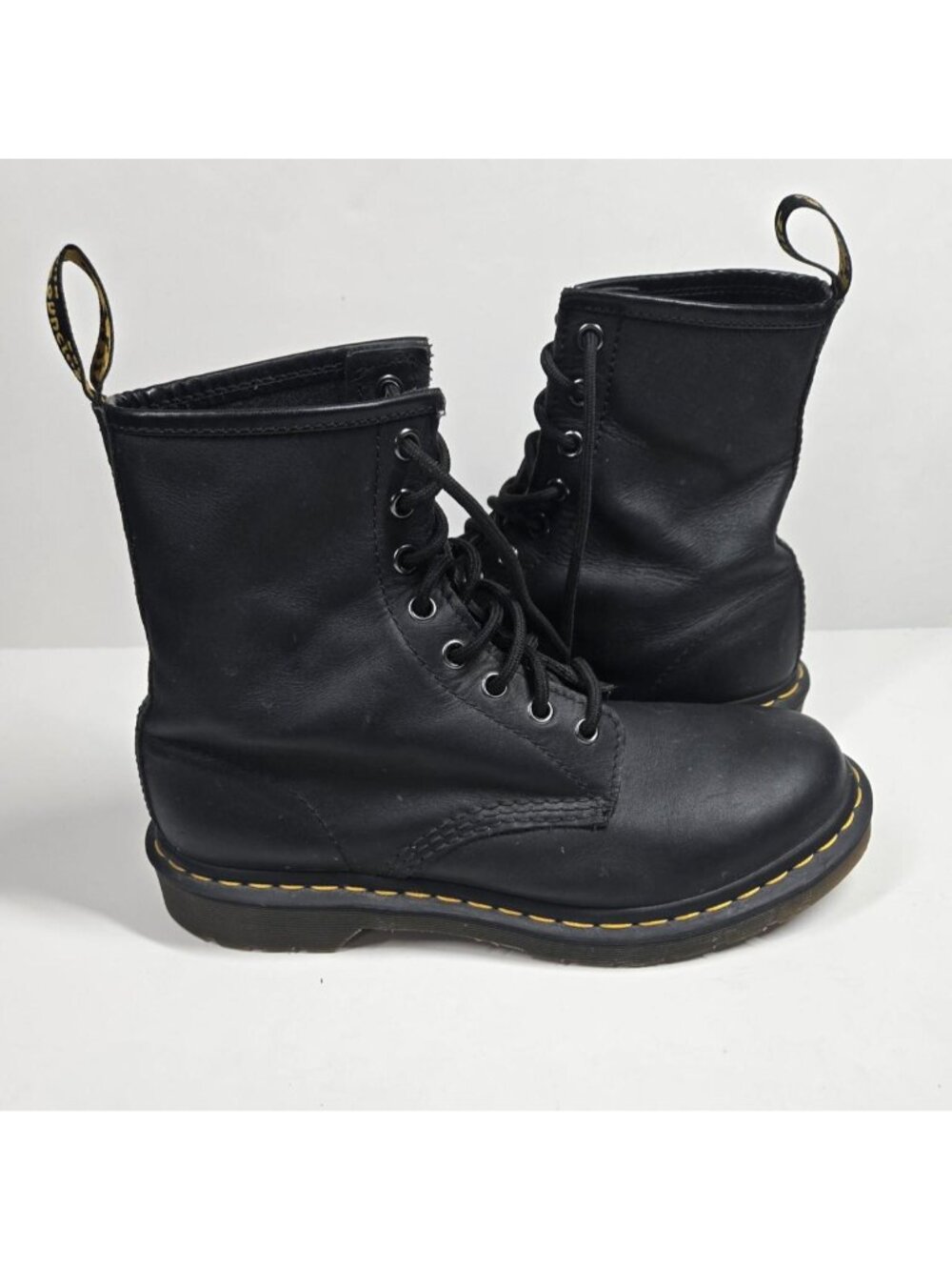 Dr. Martens 1460 Classic lace up combat boots in black leather.
